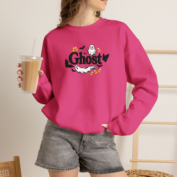 Embroider Halloween Ghost pink Color Sweater women model posing front view holding a drink in her hand 