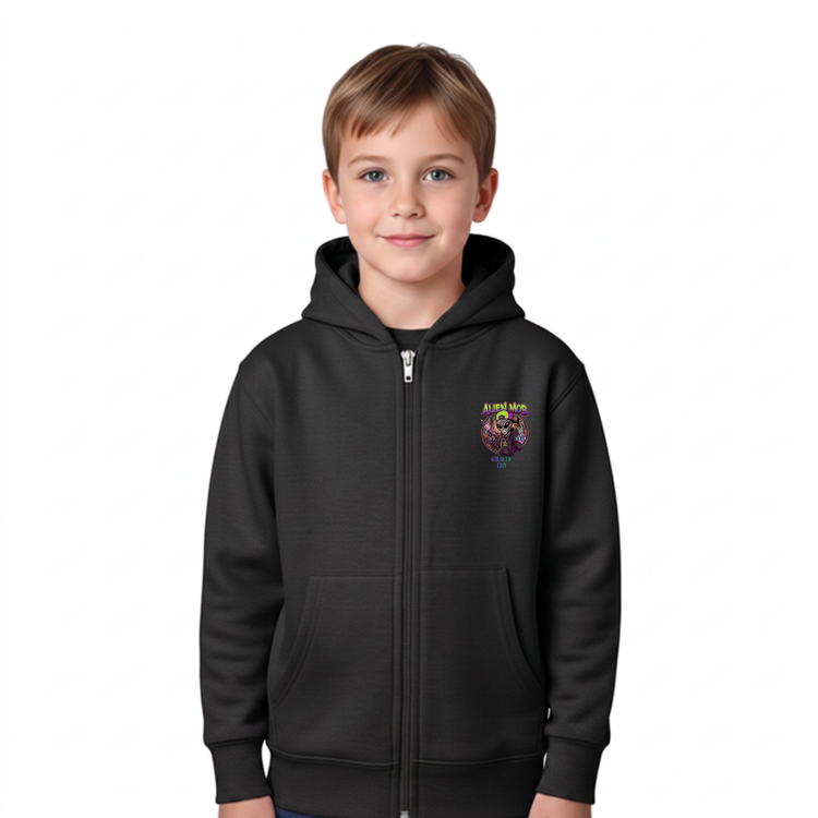A young boy wearing a black zip-up hoodie with a colorful  Alien graphic on the left chest, photographed against a solid white background. Front view
