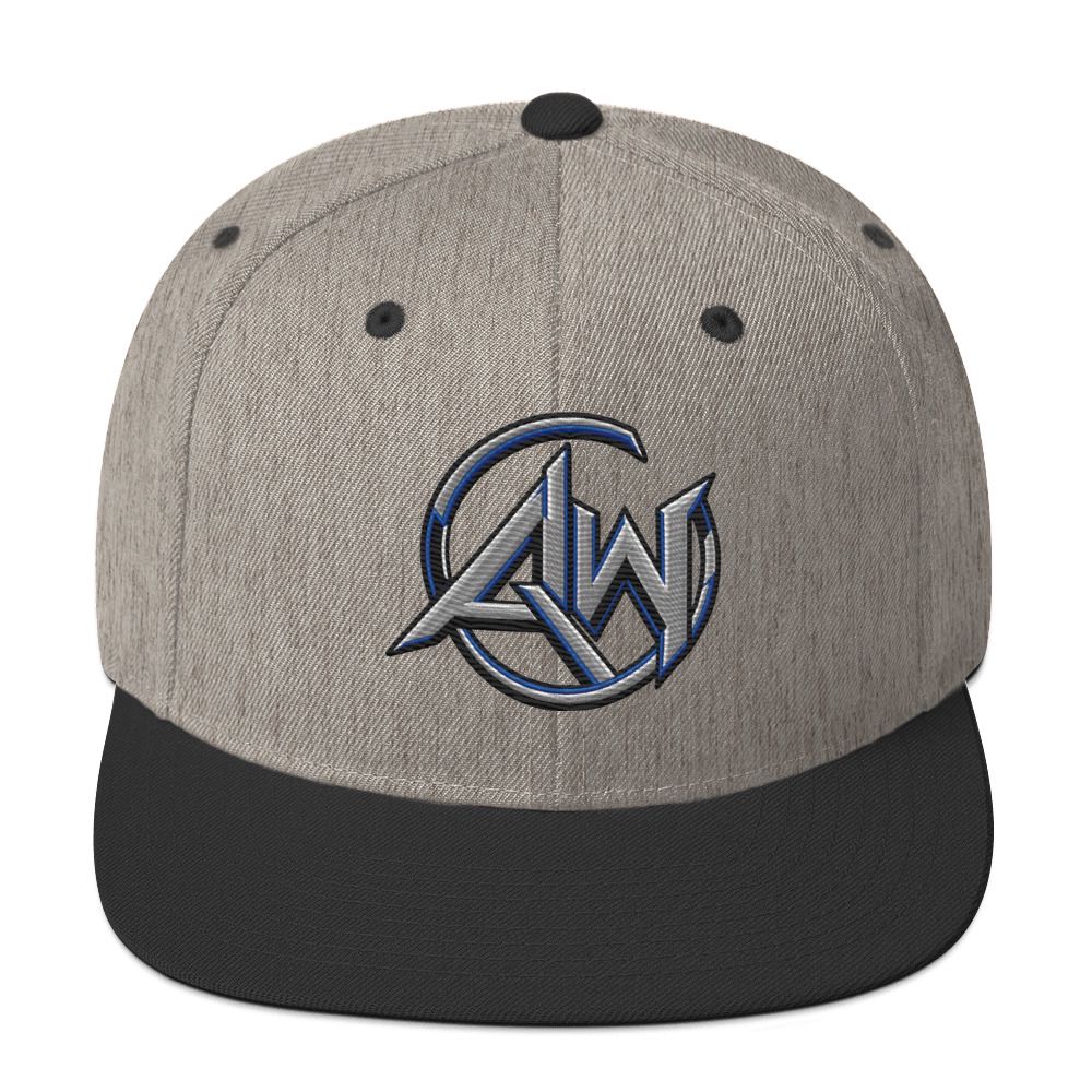 A structured snapback cap with a heather gray crown and a black flat brim, featuring a metallic blue and silver embroidered circular 'AW' logo on the front.
