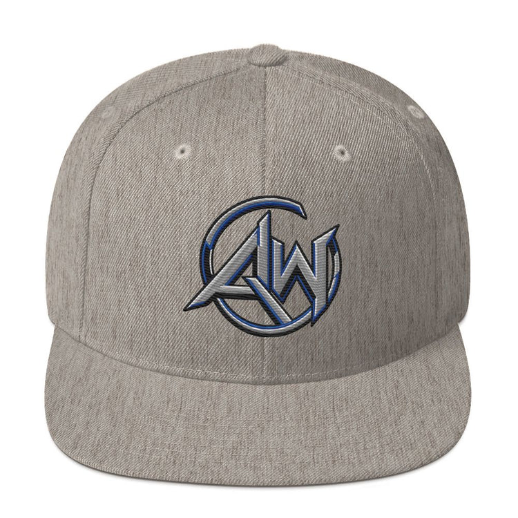 A heather gray snapback cap featuring a metallic blue and silver embroidered AW circular logo on the front, set against a plain white background.