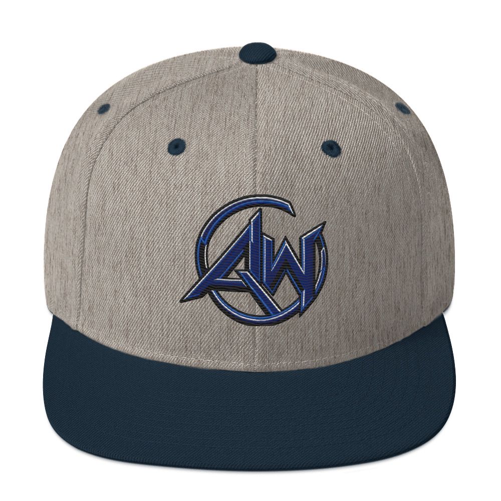 A structured snapback cap with a heather gray crown and a dark navy blue flat brim. The front of the cap features a dark navy blue embroidered logo with the letters 'AW' inside a circular design.