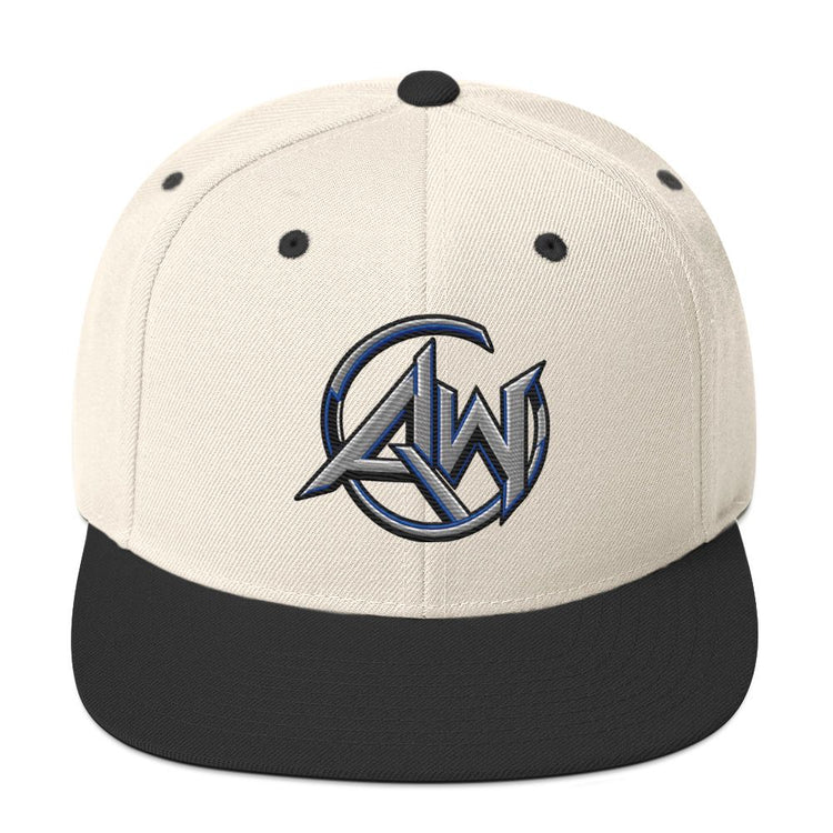 A structured baseball cap with an off-white crown and a black flat brim, featuring a metallic blue and silver stylized 'AW' logo embroidered on the front.