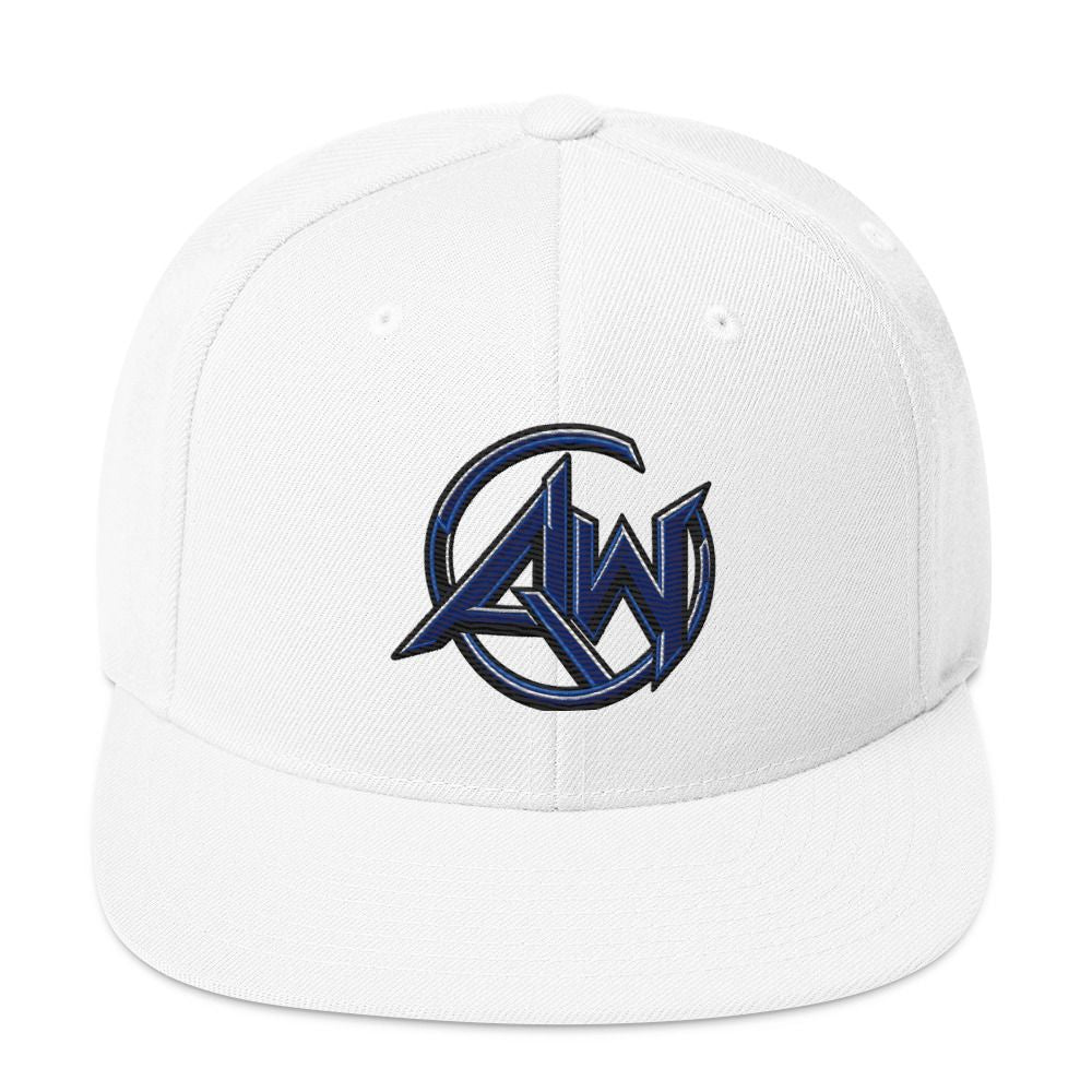 A white structured baseball cap with a flat brim, featuring a dark blue and black embroidered circular 'AW' logo on the front panel.