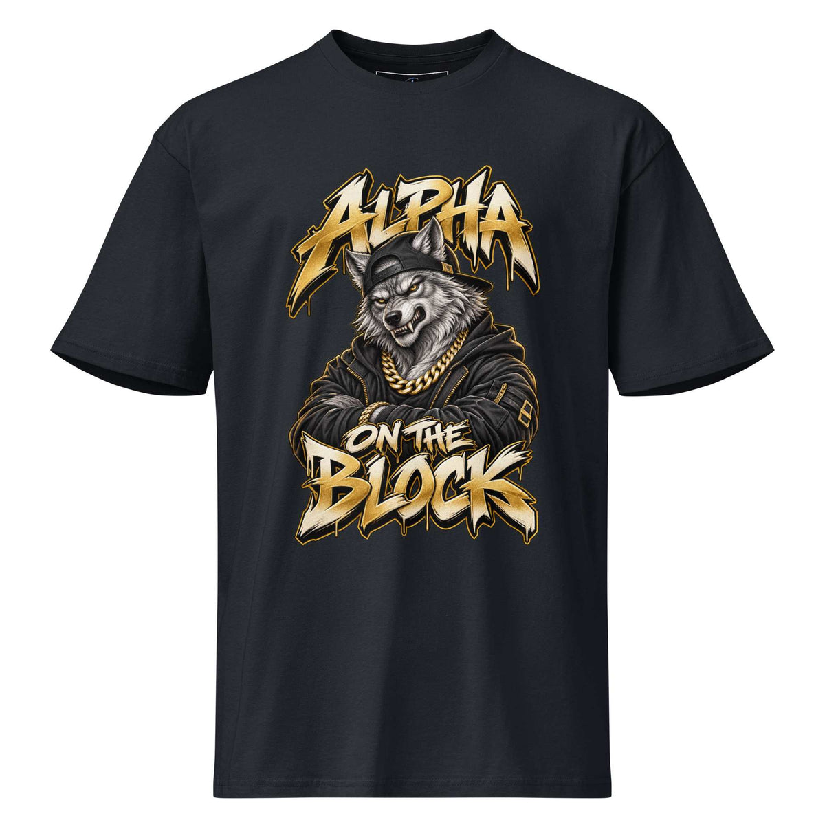 A black short-sleeve crewneck t-shirt featuring a graphic print of a wolf wearing a gold chain and cap, with the text 'ALPHA ON THE BLOCK' in a stylized gold and white font.