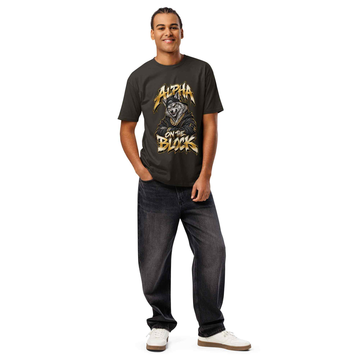 Man wearing a black t-shirt with a graphic wolf design on a white background