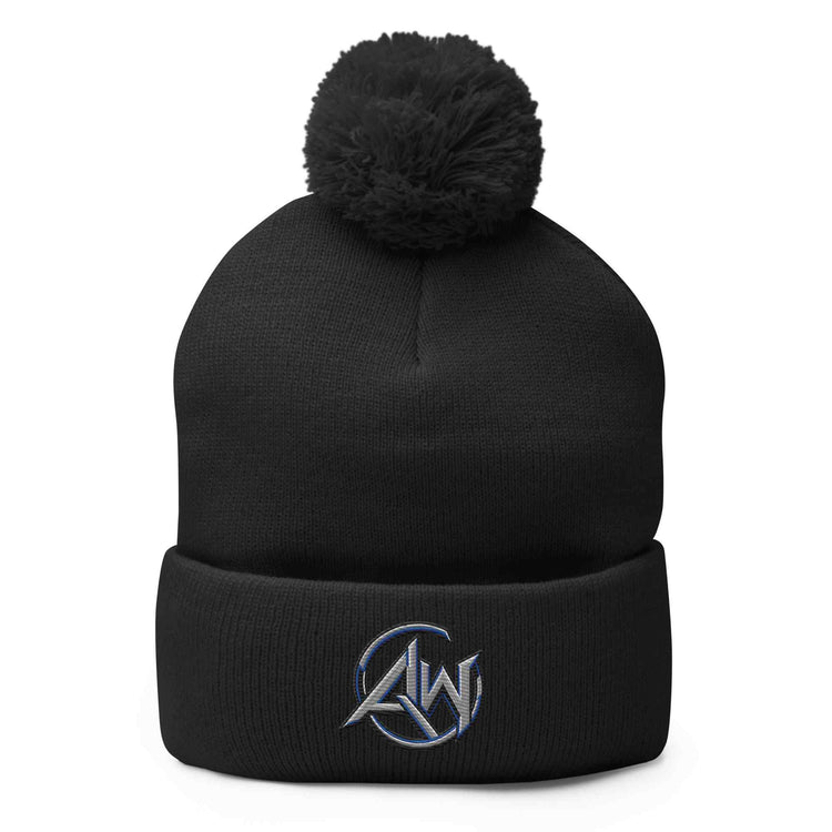 A black knit pom-pom beanie with a folded cuff and a metallic silver and blue embroidered 'AW' logo on the front, shown against a plain white background.