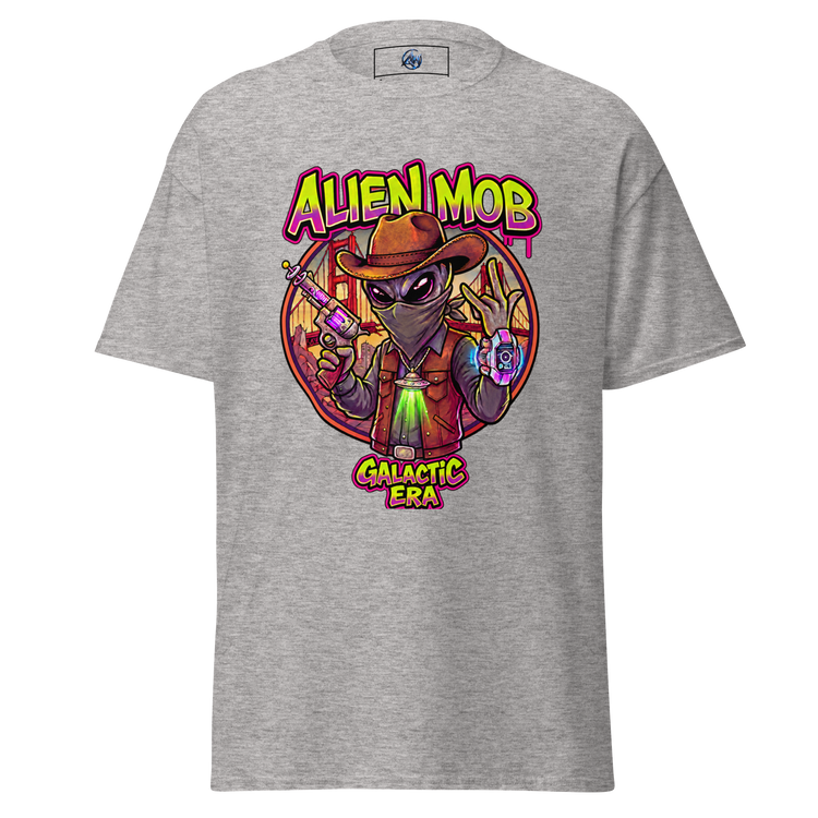 A heather gray short-sleeve t-shirt with a colorful graphic print on the front. The graphic features an alien character wearing a cowboy hat and vest, holding a gun, with the text 'ALIEN MOB' above and 'GALACTIC ERA' below.