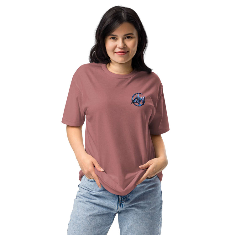 Woman wearing a pink t-shirt with an AW  logo on a white background