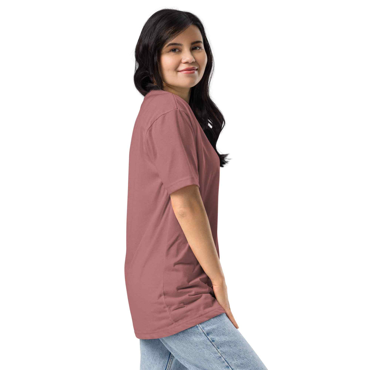 Woman wearing a mauve t-shirt against a white background