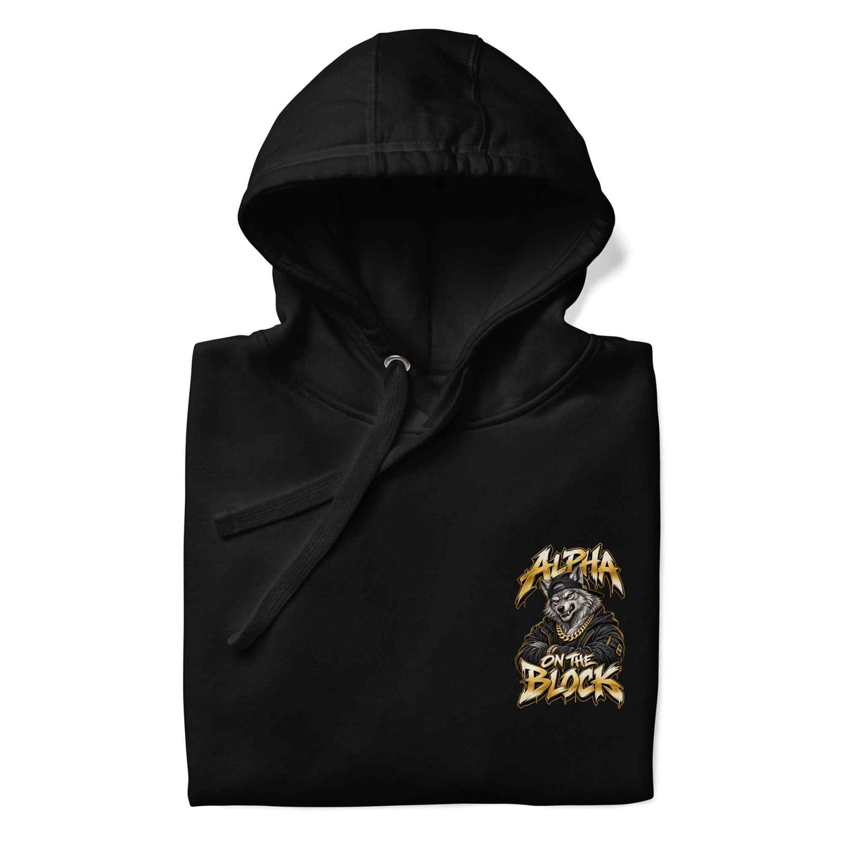 A folded black hoodie with a drawstring hood, featuring a graphic print on the left chest of a wolf wearing a gold hood and the text 'ALPHA ON THE BLOCK' in a stylized gold font, shown on a plain white background.