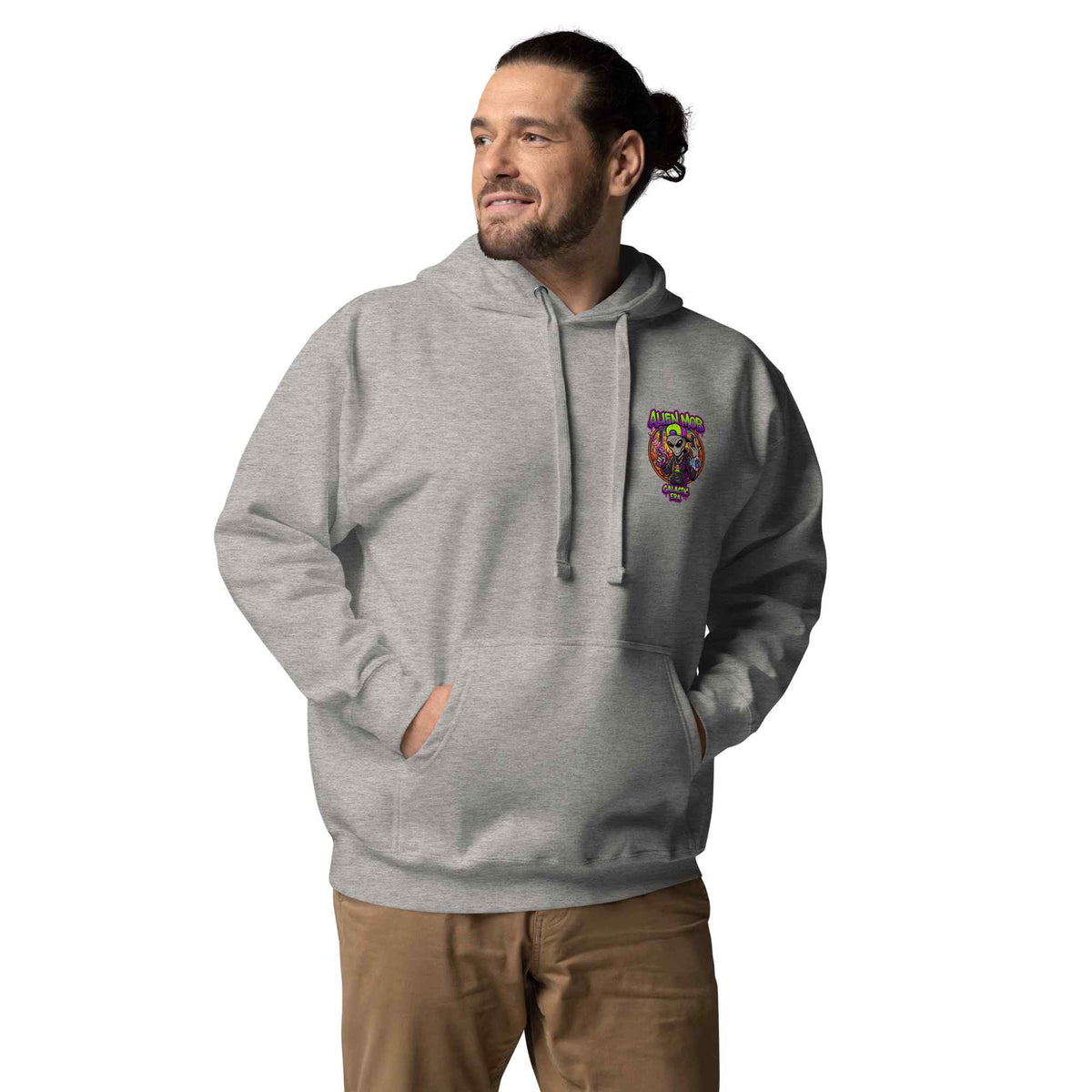 Man wearing a Carbon stone light gray  hoodie with an alien mob logo on a white background