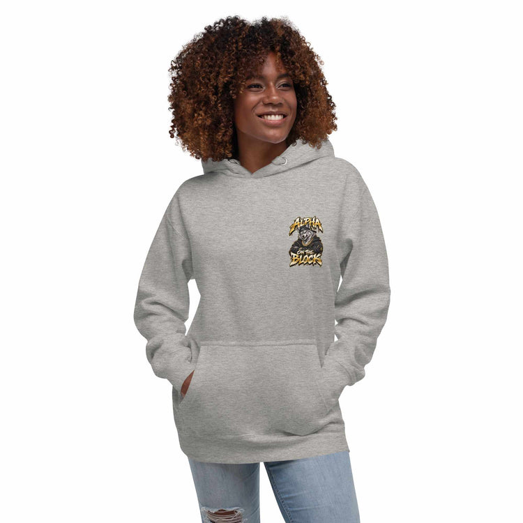 A woman wearing a gray hoodie with a wolf logo on a white background