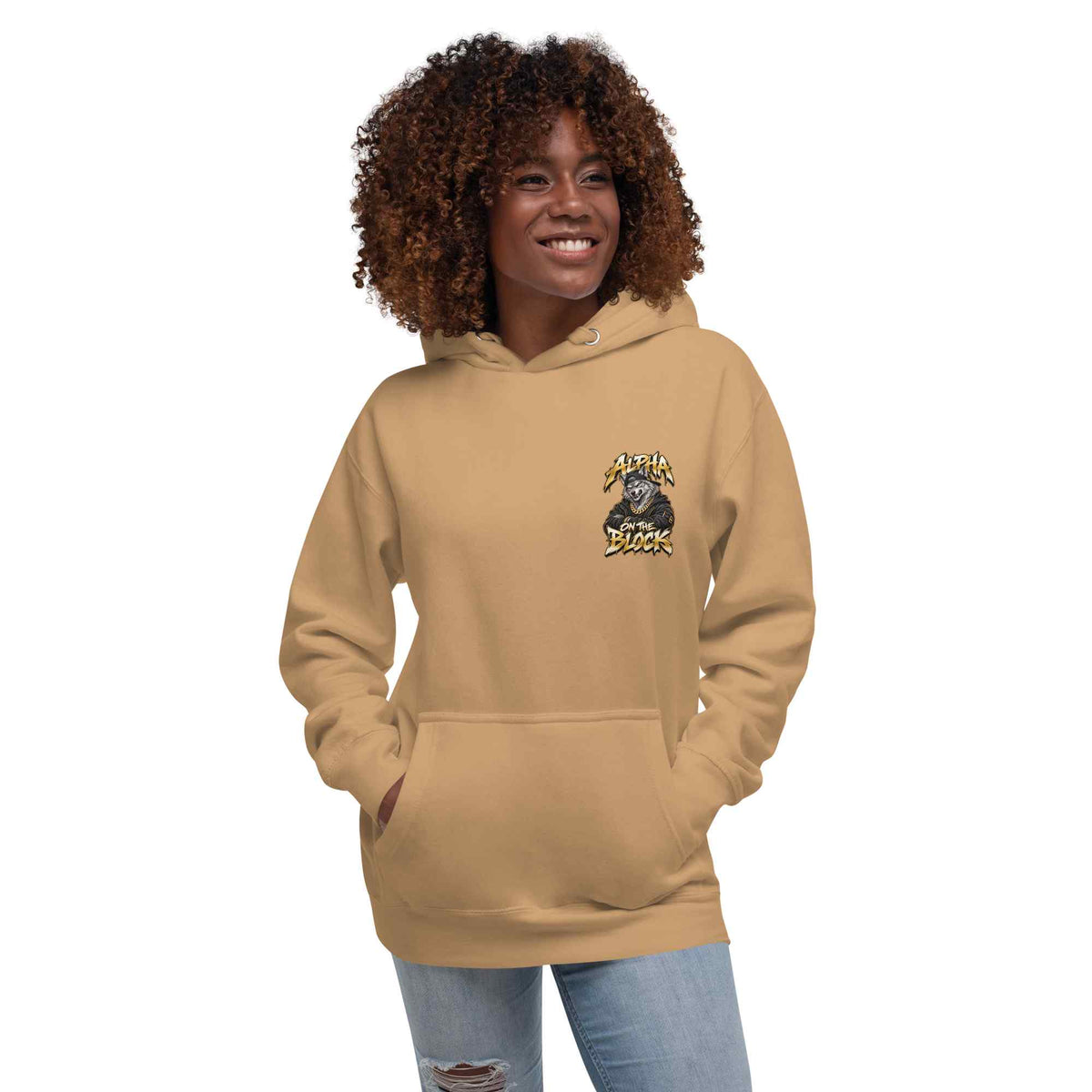 A black woman with brown curly hair  wearing a beige hoodie with a  wolf logo on a white background