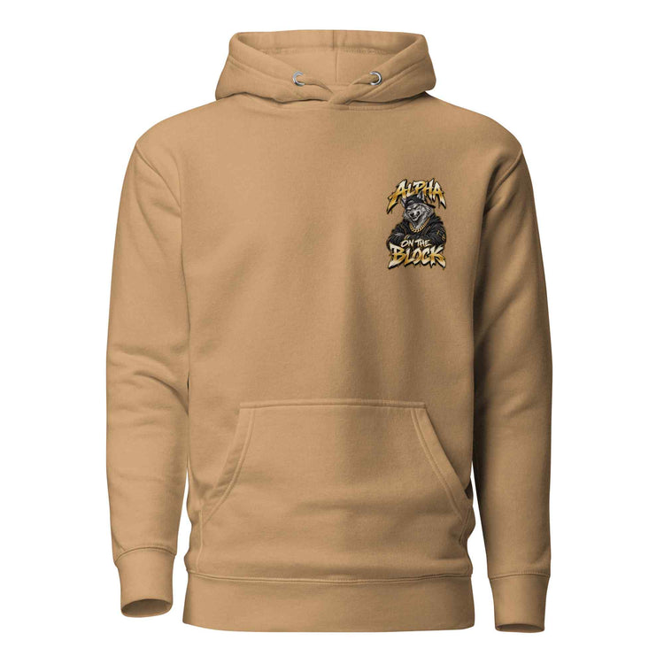 A tan pullover hoodie with a kangaroo pocket and a small chest graphic featuring the text 'Alpha Block' and a wolf illustration, shown on a plain white background