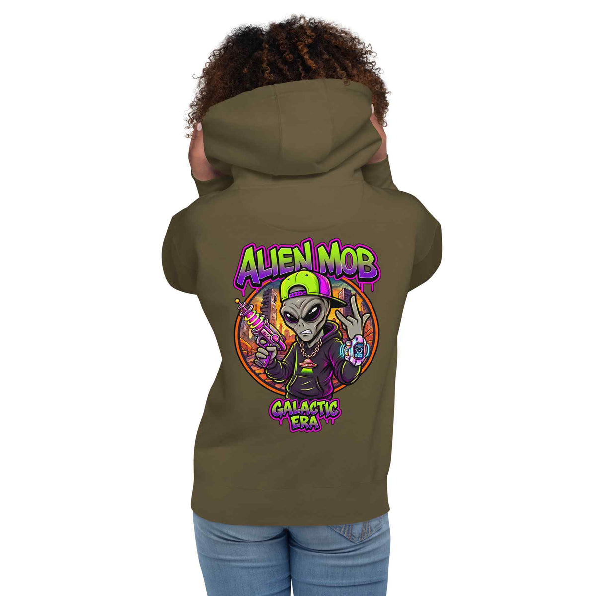 A woman shown from the back wearing a military hoodie with a large colorful graphic on the back featuring an alien and the text 'ALIEN MOB GALACTIC ERA'