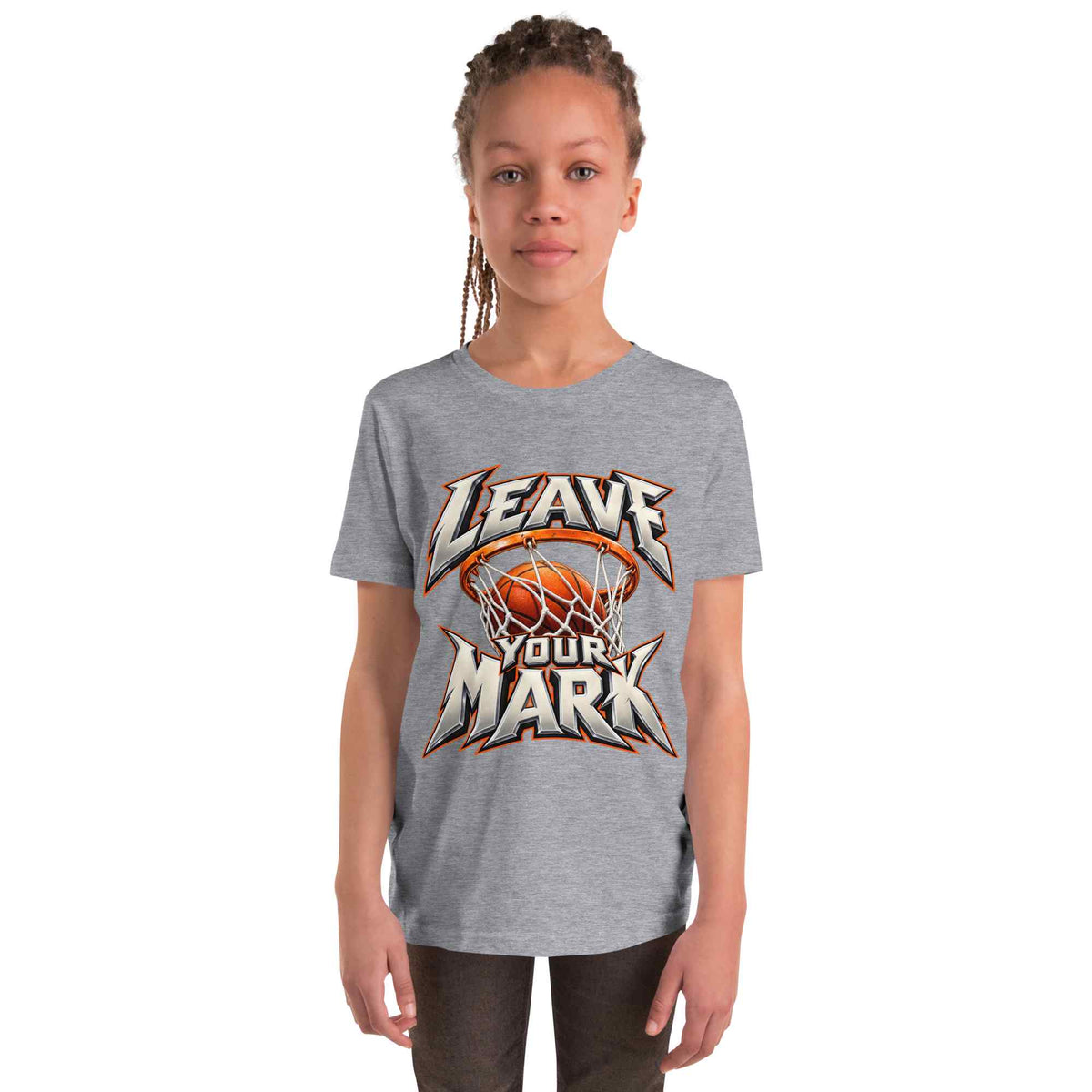 A young girl with braided hair wearing a heather gray t-shirt with a basketball-themed graphic that reads 'LEAVE YOUR MARK'. The background is solid white.