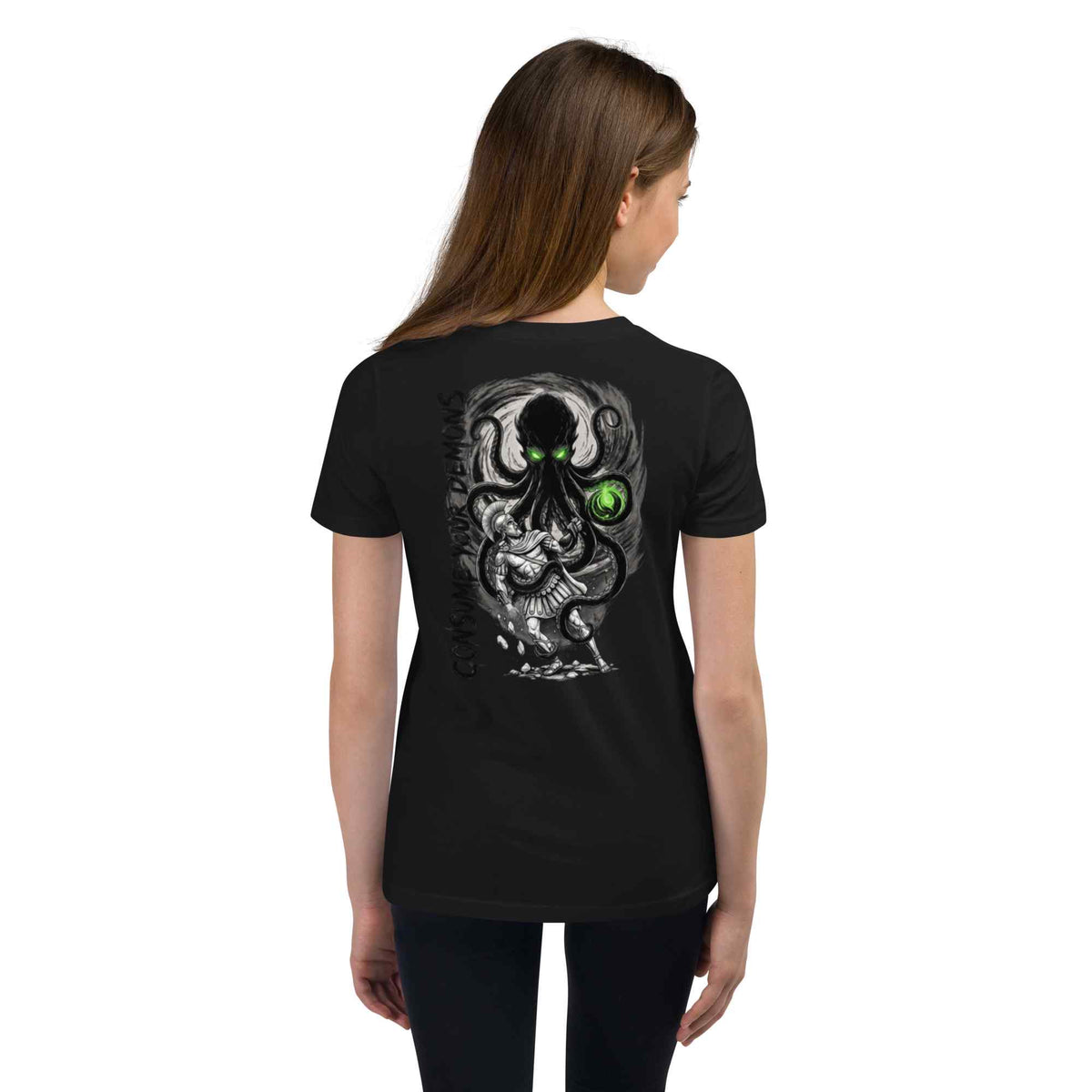 A woman viewed from the back wearing a black short-sleeve T-shirt with a large graphic print of a kraken creature with green glowing eyes and a snake, on a plain white background.