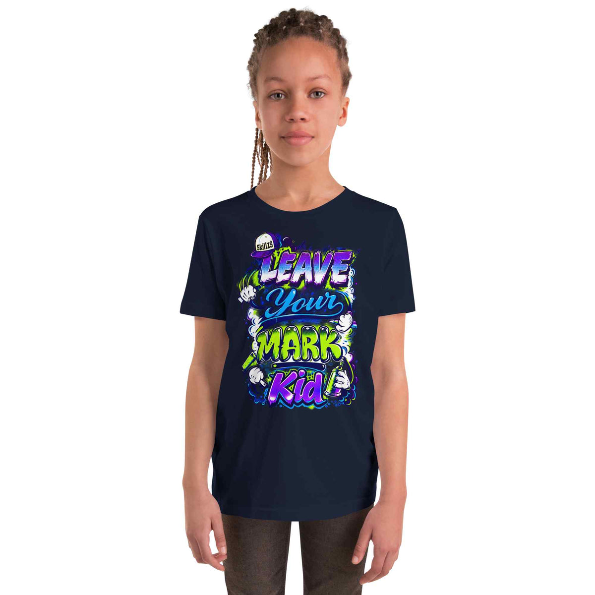 a kid wearing a navy blue t-shirt with a graphic Leave Your Mark Kid design on a white background