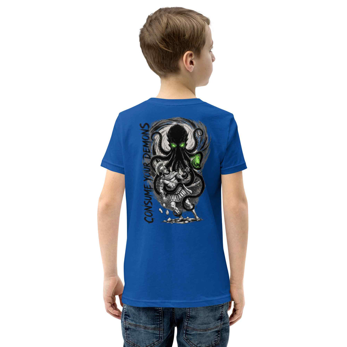 A child model shown from the back wearing a royal blue t-shirt with a large black and gray octopus graphic and green eyes on the back, paired with blue jeans against a plain white background.