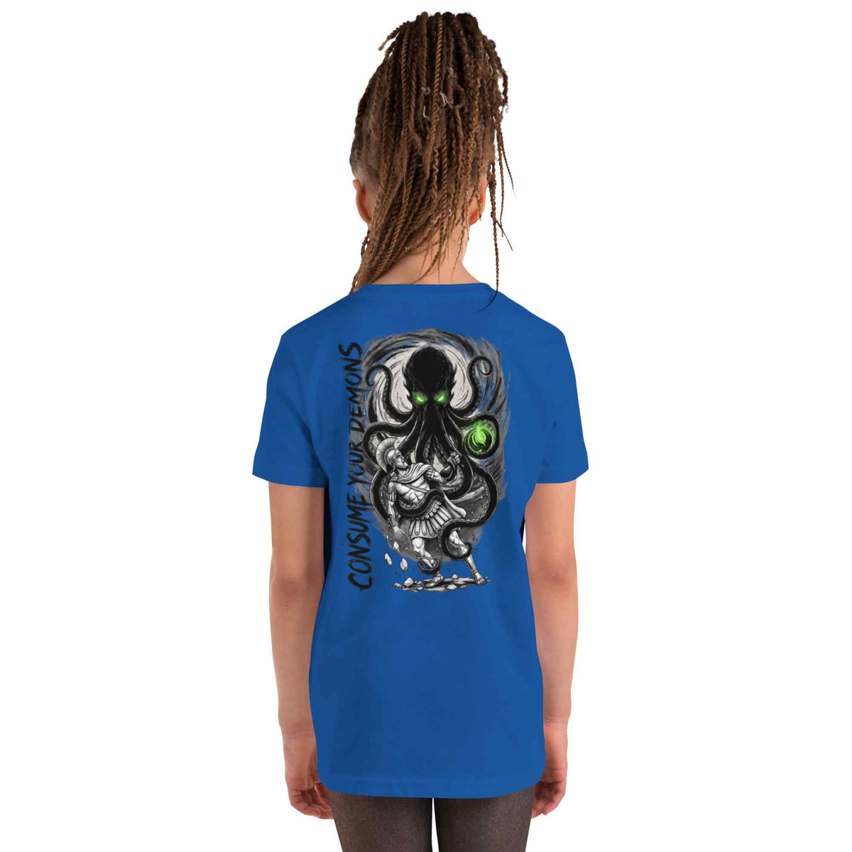 A child model shown from the back wearing a royal blue t-shirt with a large black and white octopus graphic and the text 'CONSUME YOUR Demons' printed on the back.