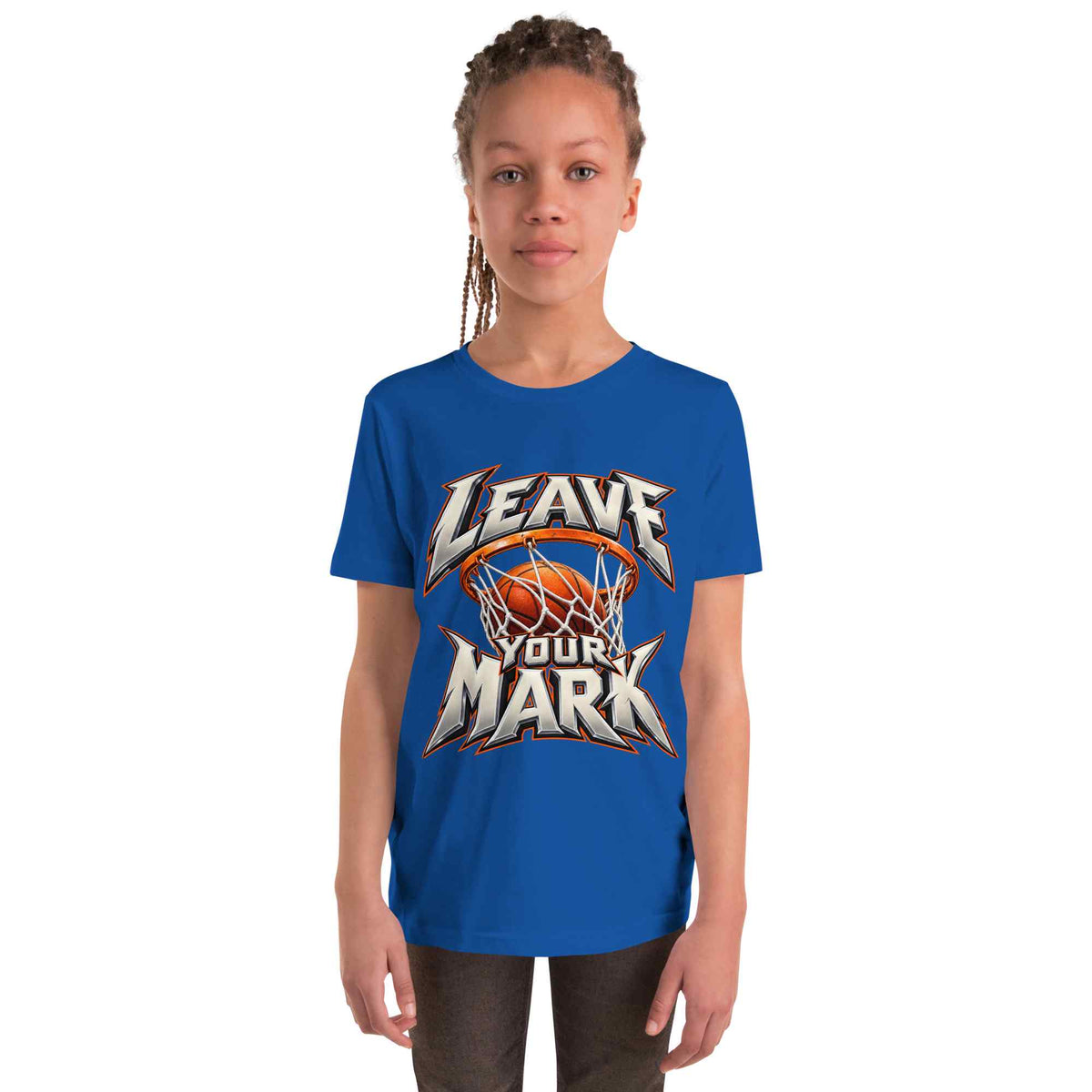 A young girl with braided hair wearing a royal blue t-shirt with a 'LEAVE YOUR MARK' basketball graphic, standing against a plain white background.