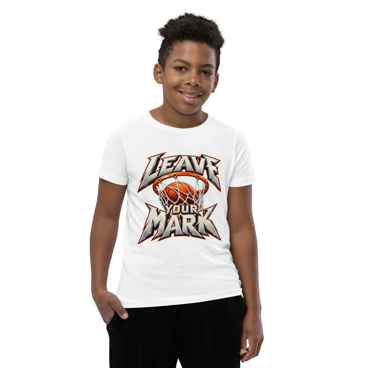 A child model wearing a white short-sleeve t-shirt with a custom basketball-themed graphic that reads 'LEAVE YOUR MARK' in stylized lettering around an orange basketball and hoop.